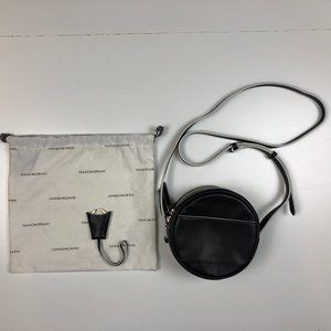 Isaac Mizrahi Nolita black circle crossbody bag
